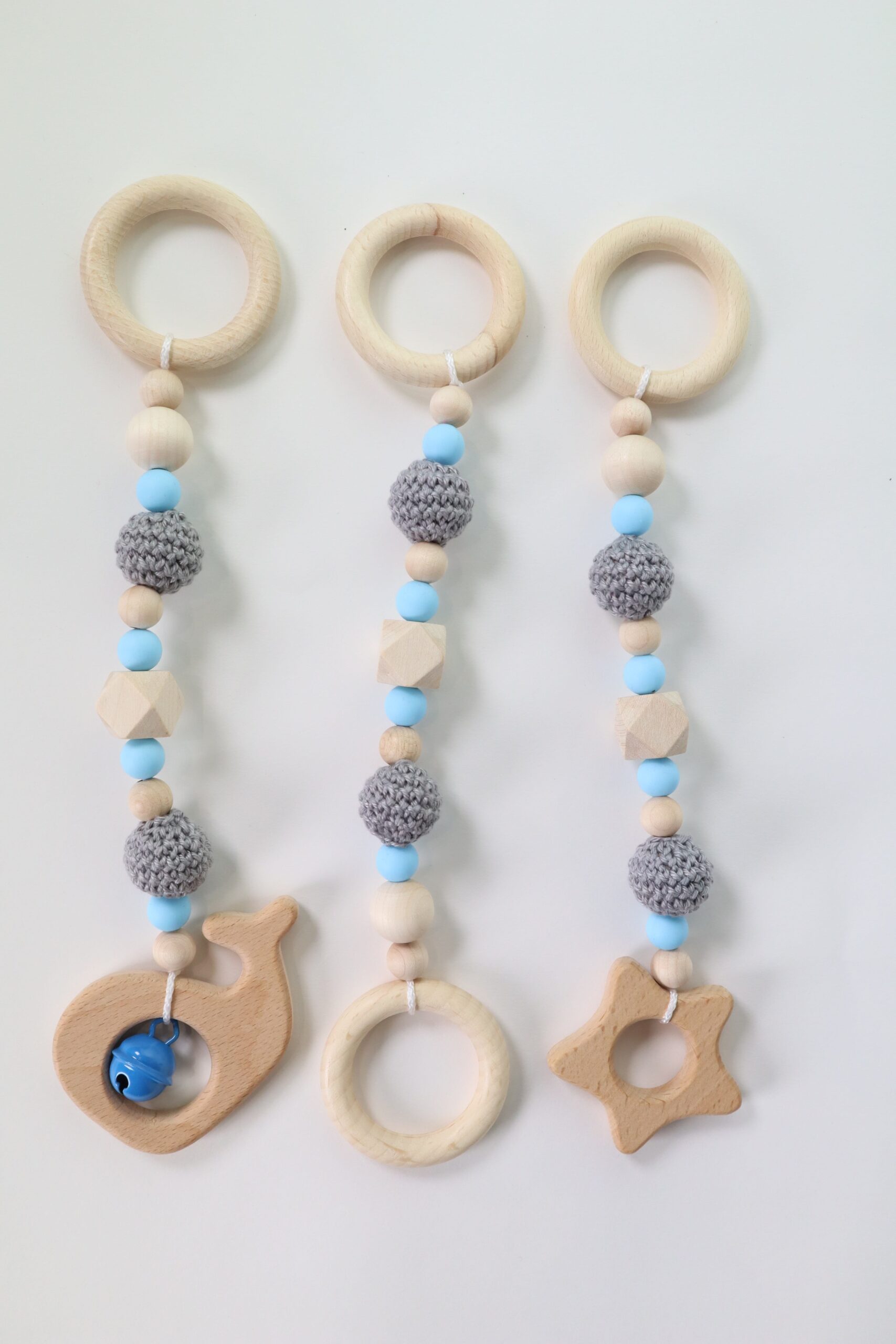 Baby, Ausstattung, babyausstattung, babygeschenk, geschenk. baby shoer, beißring, greidling, zahnen, zahnungshilfe, spielzeug, holz, natur, spiel, spiele, spielen, Spielebogen, greifring, greifen, sehen, tasten